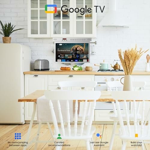 Google TV in a white kitchen with chairs and table.