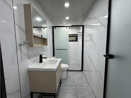 Modern bathroom with sleek design and fixtures.