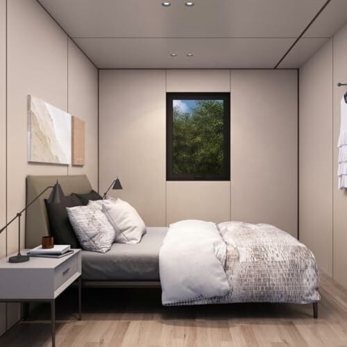 Minimalist bedroom with bed, nightstand, and window.