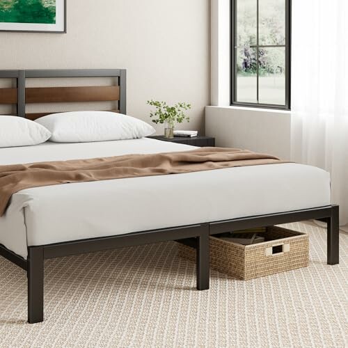 Minimalist bedroom with a bed, brown blanket, and window