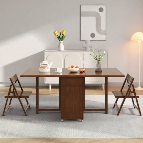Modern dining room with wooden table, chairs, and decor.
