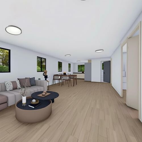 Spacious modern living and dining area with neutral decor.