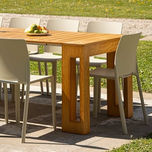 Outdoor wooden dining table with chairs and fruit bowl