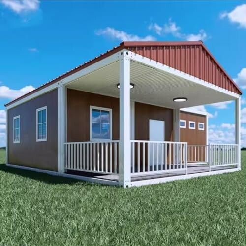 Modern tiny house with porch and red roof on grassy field.
