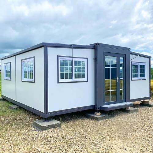 Portable office container with windows and a glass door
