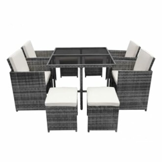 Rattan patio dining set with glass table and cushioned chairs