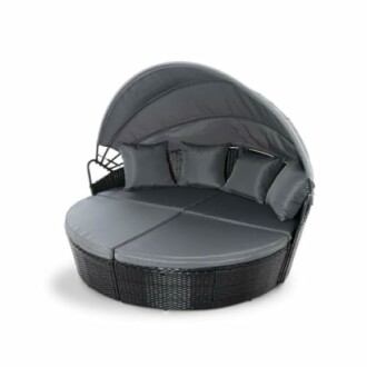 Round outdoor daybed with canopy and cushions