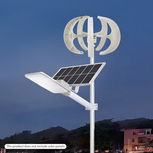 Wind turbine street light with solar panel at dusk.